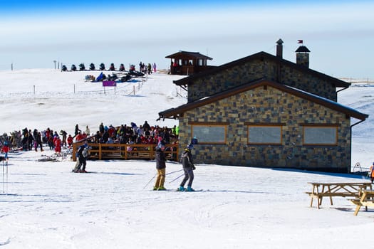 mountain  chalet with skier