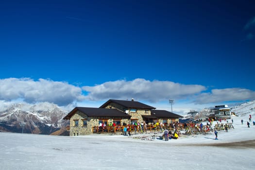 mountain  chalet with skier