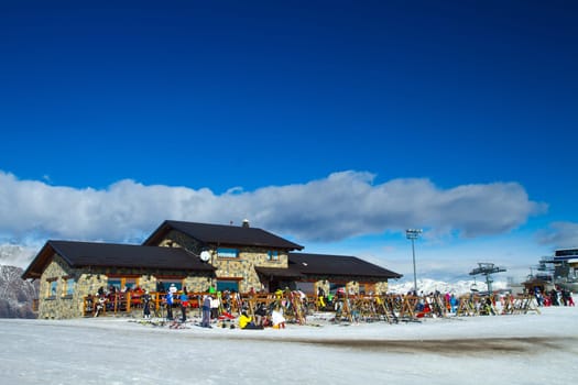 mountain  chalet with skier