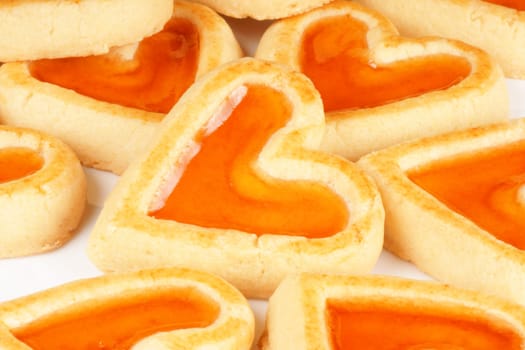 Close-up of some heart shaped apricot jam cookies for a sweet Valentine&#039 s day