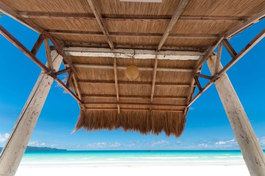 shelter made of natural materials on a tropical beach