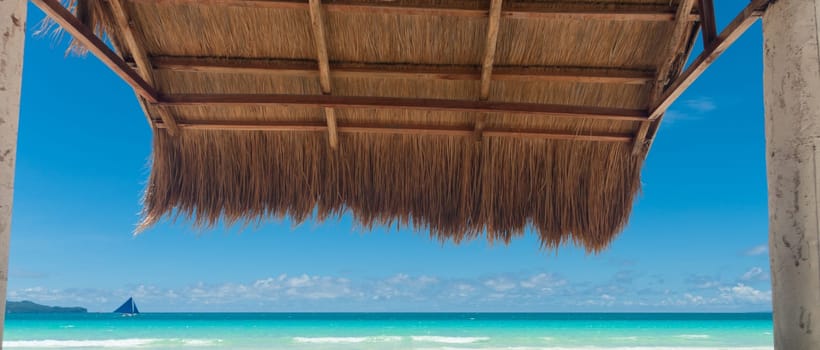 shelter made of natural materials on a tropical beach