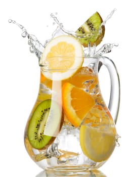 splashing orange, lemon and kiwi into a water glass