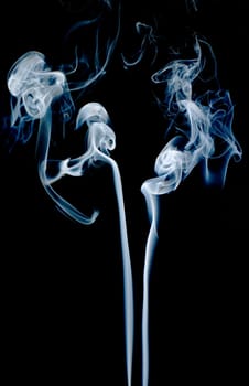 Abstract smoke isolated on dark background.