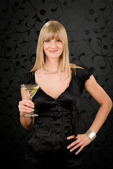 Woman party dress hold cocktail glass smiling looking at camera