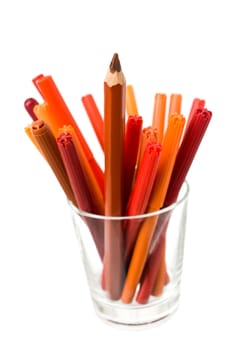 Glass of colored pencils isolated on white background