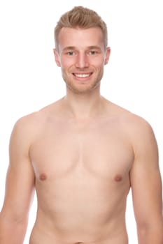 Studio shot of a young man with a bare torso against a white background