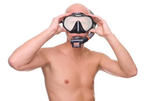 Portrait of a diver in studio against white background