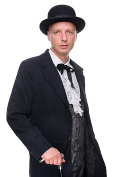 Man in western outfit against white background in studio