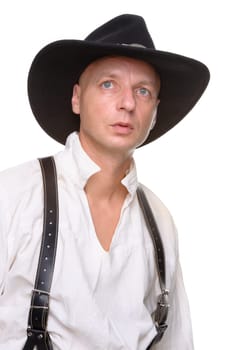Man in western outfit against white background in studio