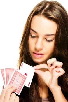 Young beautiful woman choosing a poker card on white background