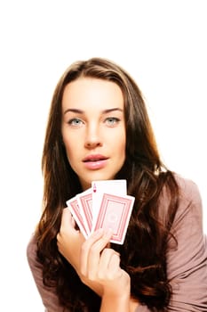 Beautiful woman with poker cards on white background
