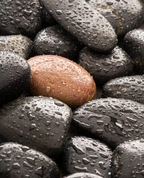 Wet spa stones close up background shoot