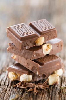 Brown chocolate with nuts close up shoot