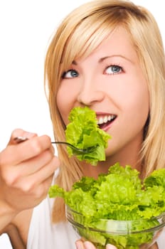 young attractive woman eating salad close up