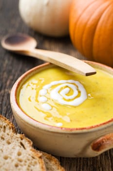 Fresh orange pumpkin soup close up shoot