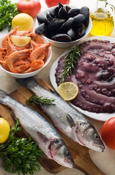 Fresh raw seafood with herbs close up shoot