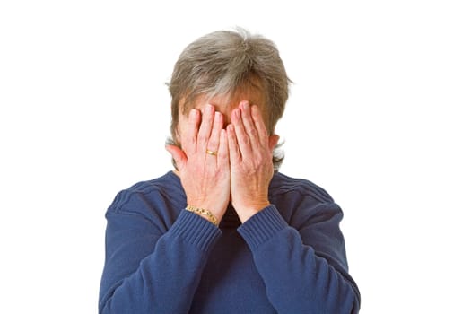 Senior woman holding her face - isolated on white background