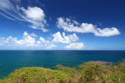 Wispy clouds form off the coast on the Caribbean island of Saint Kitts.