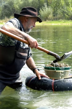 prospector panning for gold in rivers in France in the Gard region