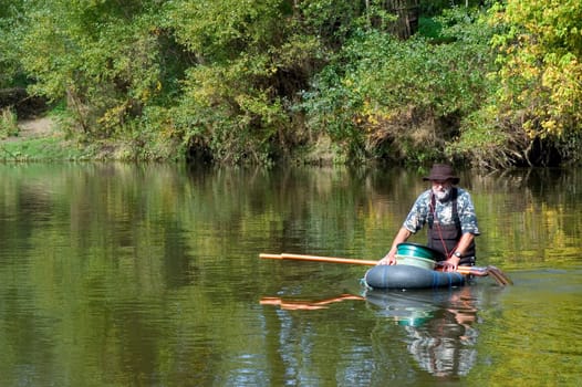 prospector panning for gold in rivers in France in the Gard region