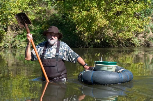 prospector panning for gold in rivers in France in the Gard region