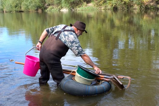 prospector panning for gold in rivers in France in the Gard region