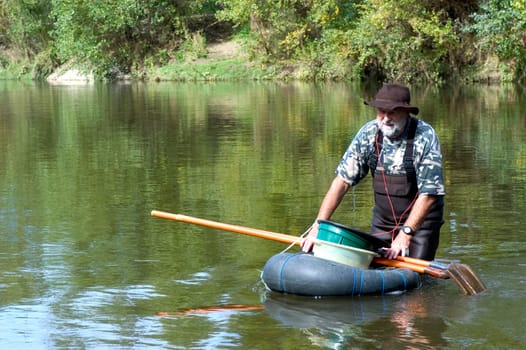 prospector panning for gold in rivers in France in the Gard region