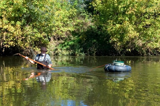 prospector panning for gold in rivers in France in the Gard region