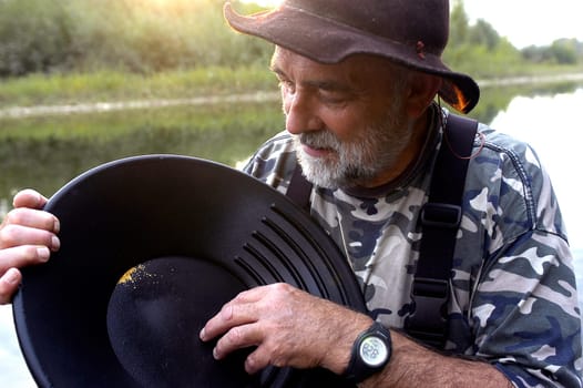 prospector panning for gold in rivers in France in the Gard region