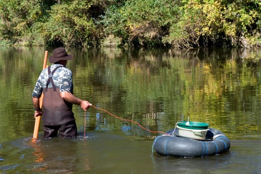 prospector panning for gold in rivers in France in the Gard region