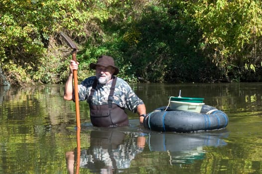 prospector panning for gold in rivers in France in the Gard region