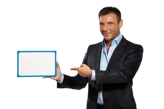 one caucasian business man holding showing whiteboard in studio isolated on white background