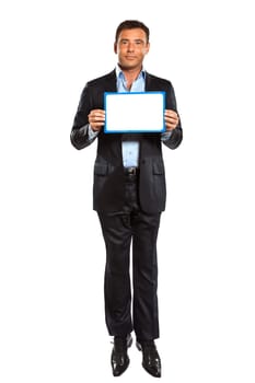 one caucasian business man  jumping holding showing whiteboard in studio isolated on white background