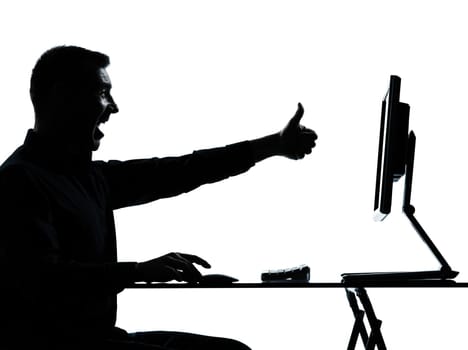 one caucasian business man computer computing silhouette in studio isolated on white background