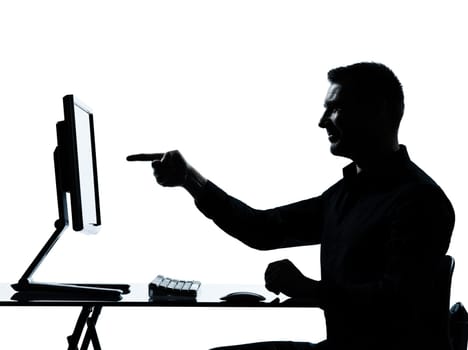 one caucasian business man pointing gesture computer computing silhouette in studio isolated on white background