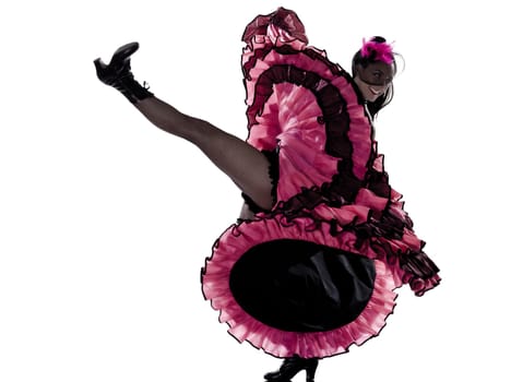 woman dancer dancing french cancan in studio isolated on white background