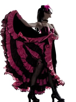 woman dancer dancing french cancan in studio isolated on white background