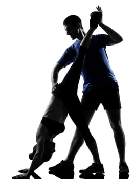 couple woman man exercising workout fitness aerobics posture in silhouette studio isolated on white background