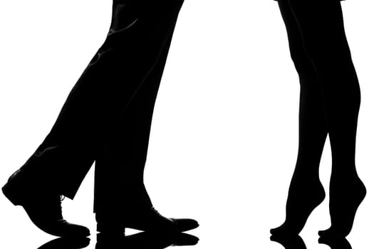 one caucasian detail legs feet couple man and woman tiptoe lovers teenderness in studio silhouette isolated on white background