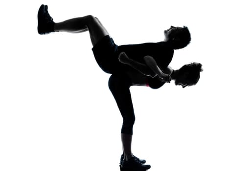 one couple man woman exercising workout aerobic fitness posture full length silhouette on studio isolated on white background
