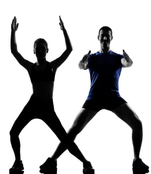 couple woman man exercising workout fitness aerobics posture in silhouette studio isolated on white background
