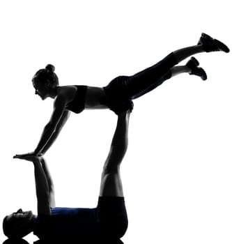 couple woman man exercising workout fitness aerobics posture in silhouette studio isolated on white background