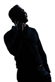 one caucasian man happy telephone portrait silhouette in studio isolated white background