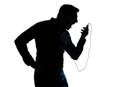 one caucasian man  telephone videophone  portrait silhouette in studio isolated white background
