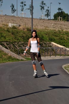 The young woman shows a good figure in sports
