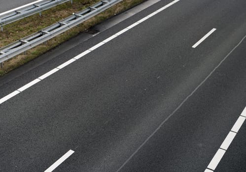 view from a bridge over a several lanes highway with porous asphalt