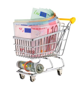 A stack of euro bills in a shopping cart,isolated on white