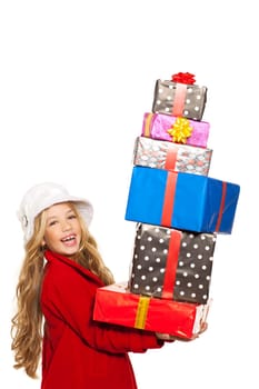 kid girl holding many gifts stacked on her hand isolated on white