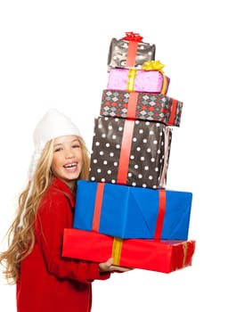 kid girl holding many gifts stacked on her hand isolated on white